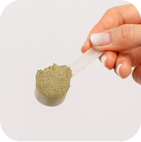 Scoop of PetMade Longevity Formula being added to food